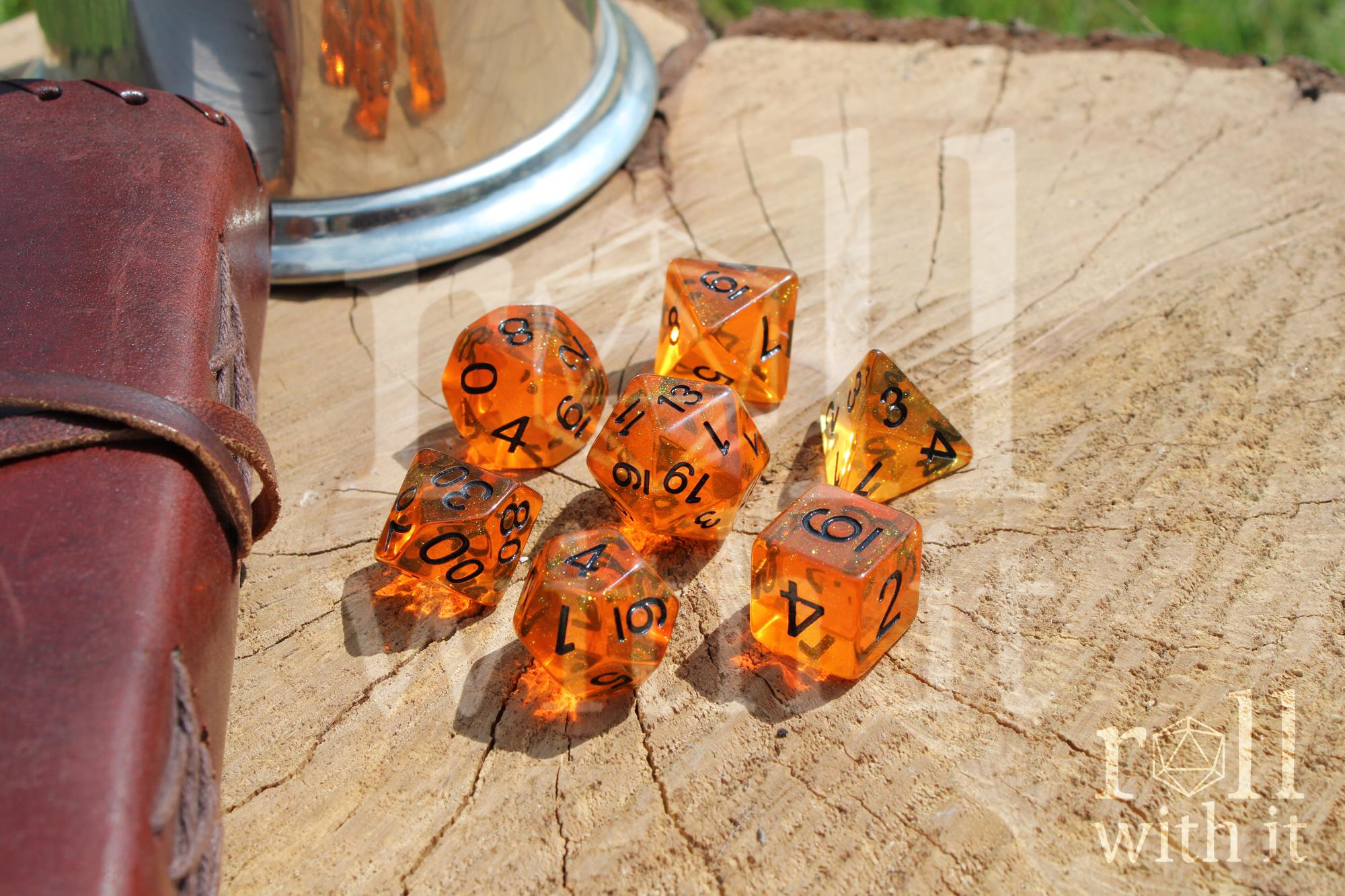 Tangerine Sunkiss Orange polyhedral dice set on a wooden surface with 'roll with it' text.