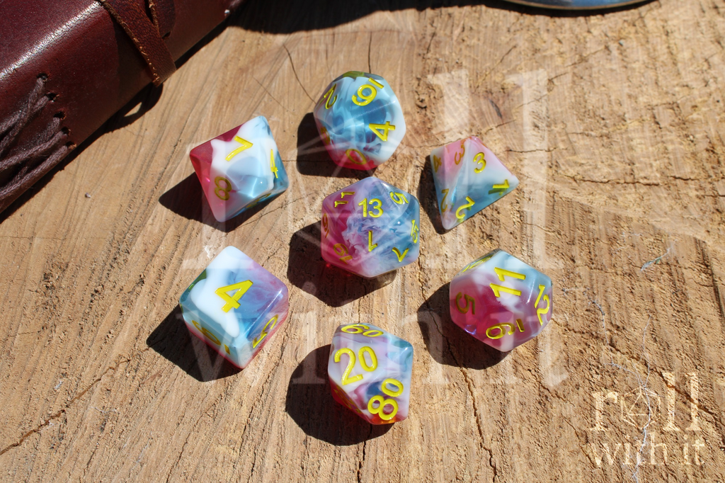 Set of swirling red, blue and white polyhedral roleplaying dice for DnD and other TTRPG games, sat on a wooden base