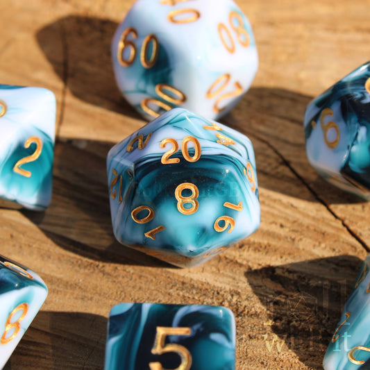 Set of polyhedral roleplaying dice with blue and white marbling on a wooden surface