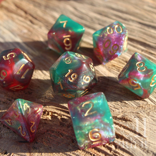 Set of colorful shiny glitter filled dnd polyhedral dice with numbers on a wooden surface